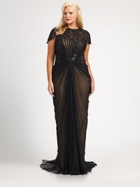 A stunning sequin neckline is complemented flawlessly by flattering ruched details.Embellished neckline and cap sleevesPleated and ruched bodiceBack zipperFully linedAbout 62 from natural waistPolyesterDry cleanImported A stunning sequin neckline is complemented flawlessly by flattering ruched details.Embellished neckline and cap sleevesPleated and ruched bodiceBack zipperFully linedAbout 62 from natural waistPolyesterDry cleanImported
