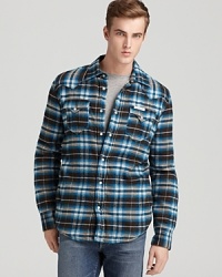 A rugged alternative to that same-old coat, this warm plaid shirt-jacket from True Religion offers masculine appeal and frontier styling on brisk days. A rugged alternative to that same-old coat, this warm plaid shirt-jacket from True Religion offers masculine appeal and frontier styling on brisk days.