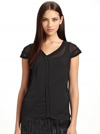 Diaphanous rayon top has tonal piped seams and asymmetrical V neckline for a forward thinking design.Asymmetrical V-neck Short sleeves Pullover style Tonal piped seams, front and back About 24 from shoulder to hem Rayon Dry clean Made in ItalyPlease note: Camisole sold separately. Diaphanous rayon top has tonal piped seams and asymmetrical V neckline for a forward thinking design.Asymmetrical V-neck Short sleeves Pullover style Tonal piped seams, front and back About 24 from shoulder to hem Rayon Dry clean Made in ItalyPlease note: Camisole sold separately.