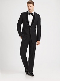 A modern approach to a formal wear favorite, tailored in superior wool with velvet trim. Dry Clean. Made in Italy.JACKETOne-button frontShawl collarChest, waist welt pocketsFour button detail at cuffAbout 28 from shoulder to hemPANTFlat front styleSide slash, back welt pocketsInseam, about 32 A modern approach to a formal wear favorite, tailored in superior wool with velvet trim. Dry Clean. Made in Italy.JACKETOne-button frontShawl collarChest, waist welt pocketsFour button detail at cuffAbout 28 from shoulder to hemPANTFlat front styleSide slash, back welt pocketsInseam, about 32