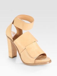 Slightly faded leather design with a wrap-around ankle strap, chunky heel and wide Velcro® straps. Self-covered heel, 4 (100mm)Covered platform, 1 (25mm)Compares to a 3 heel (75mm)Leather upperLeather lining and solePadded insoleMade in ItalyOUR FIT MODEL RECOMMENDS ordering true whole size; ½ sizes should order the next whole size down. Slightly faded leather design with a wrap-around ankle strap, chunky heel and wide Velcro® straps. Self-covered heel, 4 (100mm)Covered platform, 1 (25mm)Compares to a 3 heel (75mm)Leather upperLeather lining and solePadded insoleMade in ItalyOUR FIT MODEL RECOMMENDS ordering true whole size; ½ sizes should order the next whole size down.