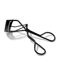 Curling your lashes is an instant eye opener. Bobbi's Eyelash Curler gives lashes a natural-looking curl and is designed for use on lashes before applying mascara. Crafted in black metal. Includes one replacement pad. Curling your lashes is an instant eye opener. Bobbi's Eyelash Curler gives lashes a natural-looking curl and is designed for use on lashes before applying mascara. Crafted in black metal. Includes one replacement pad.