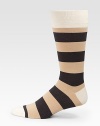 Bold stripes add color and warmth underfoot.Mid-calf heightRibbed cuff72% cotton/26% nylon/2% spandexMachine washImported