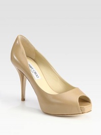 From the 24:7 Collection. Creamy leather essential with a platform and classic peep toe. Self-covered heel, 4 (100mm)Covered platform, 1 (25mm)Compares to a 3 heel (75mm)Leather upperLeather liningBuffed leather solePadded insoleMade in ItalyOUR FIT MODEL RECOMMENDS ordering one half size up as this style runs small. From the 24:7 Collection. Creamy leather essential with a platform and classic peep toe. Self-covered heel, 4 (100mm)Covered platform, 1 (25mm)Compares to a 3 heel (75mm)Leather upperLeather liningBuffed leather solePadded insoleMade in ItalyOUR FIT MODEL RECOMMENDS ordering one half size up as this style runs small.