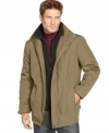 Stave off the rain in style with this water-resistant and insulated Calvin Klein jacket with removable hood.