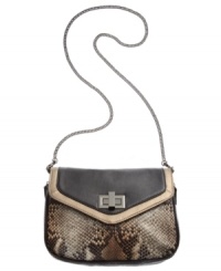 Amp up your wow-factor with this daring design from Danielle Nicole. A python print design with tonal trim and shiny signature hardware will guarantee to turn heads. Amp up your wow-factor with this daring design from Danielle Nicole. A python print design with tonal trim and shiny signature hardware will guarantee to turn heads.