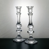 Create a dramatic, stately look with this outstanding set of 11 crystal candlesticks. Weston's profile features a beautifully sculpted spindle design - the perfect accent for any décor. Create a dramatic, stately look with this outstanding set of 11 crystal candlesticks. Weston's profile features a beautifully sculpted spindle design - the perfect accent for any décor.