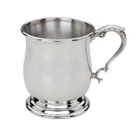 Crafted in the style of popular tankards orginially brought to New England by the British, this beautifully traditional pewter baby cup is finished with a rolled edge. It will be a treasured gift for newborns and their parents for years to come.