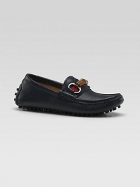 A slip-on style with a grown-up look and lots of Gucci details, including striped webbing, a bamboo horsebit and a sophisticated driver sole.Leather upperStriped webbed detailBamboo horsebit with golden hardwareRubber driver soleMade in Italy A slip-on style with a grown-up look and lots of Gucci details, including striped webbing, a bamboo horsebit and a sophisticated driver sole.Leather upperStriped webbed detailBamboo horsebit with golden hardwareRubber driver soleMade in Italy