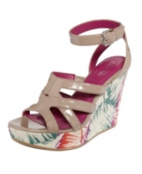 The colorful platform wedge of Calvin Klein's Jenna sandals really pops agains the shiny neutral straps. Inspired by the Brasil, they'll go great with your favorite sundress. The colorful platform wedge of Calvin Klein's Jenna sandals really pops agains the shiny neutral straps. Inspired by the Brasil, they'll go great with your favorite sundress.