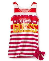 GUESS updates her summer look with a tank top, tricked out with variegated stripe patterns, distressed GUESS logo lettering and bow tie at the side hem. GUESS updates her summer look with a tank top, tricked out with variegated stripe patterns, distressed GUESS logo lettering and bow tie at the side hem.