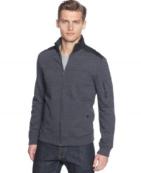 Get on track with this upgraded zip front sweatshirt by Calvin Klein. Get on track with this upgraded zip front sweatshirt by Calvin Klein.