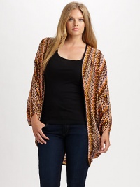 Wrap your curves in an exquisitely printed silk design with a cocoon-inspired shape.Open-front designLong sleevesAllover printSolid trimAbout 31 from shoulder to hemSilkDry cleanImported Wrap your curves in an exquisitely printed silk design with a cocoon-inspired shape.Open-front designLong sleevesAllover printSolid trimAbout 31 from shoulder to hemSilkDry cleanImported