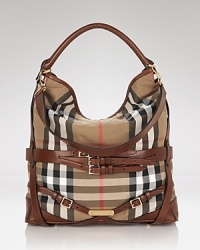 Work Burberry's classic check into your day-to-day look with this slouchy buckle-trimmed canvas hobo. Play up the contemporary edge by teaming it with spray-on leather and a slouchy knits. Work Burberry's classic check into your day-to-day look with this slouchy buckle-trimmed canvas hobo. Play up the contemporary edge by teaming it with spray-on leather and a slouchy knits.