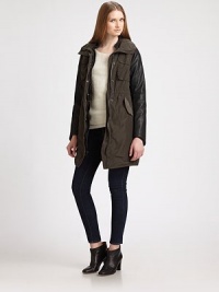 Utility-chic gets a contemporary update in this cinchable parka style finished with rich leather sleeves.Zip-out hood in collarSnap-button placket over zipper frontChest pocketsDrawstring waistFlap pocketsAbout 34 from shoulder to hemBody: polyesterTrim: leatherDry clean by a leather specialistImportedModel shown is 5'10 (177cm) wearing US size 2. Utility-chic gets a contemporary update in this cinchable parka style finished with rich leather sleeves.Zip-out hood in collarSnap-button placket over zipper frontChest pocketsDrawstring waistFlap pocketsAbout 34 from shoulder to hemBody: polyesterTrim: leatherDry clean by a leather specialistImportedModel shown is 5'10 (177cm) wearing US size 2.