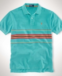 A classic short-sleeved polo shirt is cut for a relaxed, comfortable fit in smooth, soft cotton interlock. A classic short-sleeved polo shirt is cut for a relaxed, comfortable fit in smooth, soft cotton interlock.