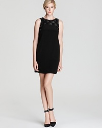 A fresh take on the little black dress, this shift dress is embellished with contrast lace trim in a fashion-forward design and a length that's just right for showing off a bit of leg. A fresh take on the little black dress, this shift dress is embellished with contrast lace trim in a fashion-forward design and a length that's just right for showing off a bit of leg.
