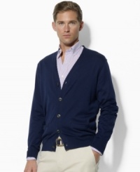 An essential layering piece for the modern gentleman, this long-sleeved cardigan is crafted from soft, durable cotton. An essential layering piece for the modern gentleman, this long-sleeved cardigan is crafted from soft, durable cotton.