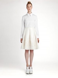 At once striking and minimal, this sharp, collared style is finished with shirt-tailored details.Point collarLong sleeves with button cuffsCotton/spandexDry cleanMade in ItalyModel shown is 5'10 (177cm) wearing US size 4. At once striking and minimal, this sharp, collared style is finished with shirt-tailored details.Point collarLong sleeves with button cuffsCotton/spandexDry cleanMade in ItalyModel shown is 5'10 (177cm) wearing US size 4.