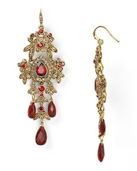 An ornate cascade of richly hued stones dangle from a French wire on this pair of Carolee earrings, lending after-hours opulence. An ornate cascade of richly hued stones dangle from a French wire on this pair of Carolee earrings, lending after-hours opulence.