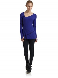 THE LOOKAsymmetrical v-neckLong sleeves with thumb holesTiered contrast trim at sleeves and hemTHE FITAbout 27 from shoulder to hemTHE MATERIALMicromodal/spandexCARE & ORIGINMachine washMade in USAModel shown is 5'8 (172½cm) wearing US size Small. THE LOOKAsymmetrical v-neckLong sleeves with thumb holesTiered contrast trim at sleeves and hemTHE FITAbout 27 from shoulder to hemTHE MATERIALMicromodal/spandexCARE & ORIGINMachine washMade in USAModel shown is 5'8 (172½cm) wearing US size Small.