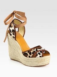 Leopard-print calf hair with leather trim and a grosgrain ribbon tie, elevated by a classic espadrille wedge. Hemp wedge, 5 (125mm)Hemp platform, 1½ (40mm)Compares to a 3½ heel (90mm)Calf hair and leather upperLeather lining and soleMade in ItalyOUR FIT MODEL RECOMMENDS ordering true whole size; ½ sizes should order the next whole size up. Leopard-print calf hair with leather trim and a grosgrain ribbon tie, elevated by a classic espadrille wedge. Hemp wedge, 5 (125mm)Hemp platform, 1½ (40mm)Compares to a 3½ heel (90mm)Calf hair and leather upperLeather lining and soleMade in ItalyOUR FIT MODEL RECOMMENDS ordering true whole size; ½ sizes should order the next whole size up.