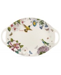 A fresh take on Portmeirion's beloved Botanic Garden pattern, the Botanic Hummingbird platter combines colorful wildlife and muted blooms on modern porcelain with integrated handles. A fresh take on Portmeirion's beloved Botanic Garden pattern, the Botanic Hummingbird platter combines colorful wildlife and muted blooms on modern porcelain with integrated handles.