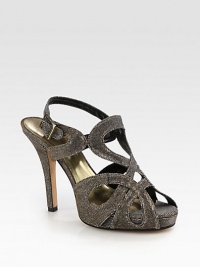 Glittery, shimmer-kissed design in soft lurex fabric with a towering heel. Self-covered heel, 4½ (115mm)Covered platform, 1 (25mm)Compares to a 3½ heel (90mm)Glitter-coated lurex upperAdjustable strapLeather lining and solePadded insoleMade in Italy Glittery, shimmer-kissed design in soft lurex fabric with a towering heel. Self-covered heel, 4½ (115mm)Covered platform, 1 (25mm)Compares to a 3½ heel (90mm)Glitter-coated lurex upperAdjustable strapLeather lining and solePadded insoleMade in Italy
