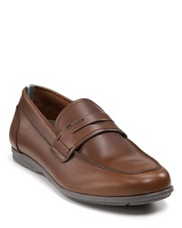 A sporty take on the classic penny loafer, this handsome slip on is crafted in eco-friendly leathers. A sporty take on the classic penny loafer, this handsome slip on is crafted in eco-friendly leathers.