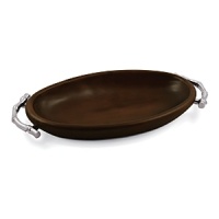 Atticus's rich Bamboo collection is the perfect way to entertain in style. A deep rosewood finish and bamboo-inspired aluminum handles make this stylish bowl the ultimate marriage of form and function. Atticus's rich Bamboo collection is the perfect way to entertain in style. A deep rosewood finish and bamboo-inspired aluminum handles make this stylish bowl the ultimate marriage of form and function.