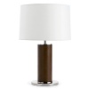 Perfect for your office, den or study, this leather-wrapped lamp with polished nickel hardware and white drum shade stands sleek with style.