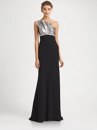 A sculptural metallic ruffle crowns this elegant, floor-length silhouette.Asymmetrical necklineBodice ruffleBeaded empire waistConcealed side zipFully linedAbout 62 from shoulder to hemBodice: 85% polyester/15% lurexSkirt: polyesterDry cleanImportedModel shown is 5'11 (180cm) wearing US size 4. A sculptural metallic ruffle crowns this elegant, floor-length silhouette.Asymmetrical necklineBodice ruffleBeaded empire waistConcealed side zipFully linedAbout 62 from shoulder to hemBodice: 85% polyester/15% lurexSkirt: polyesterDry cleanImportedModel shown is 5'11 (180cm) wearing US size 4.
