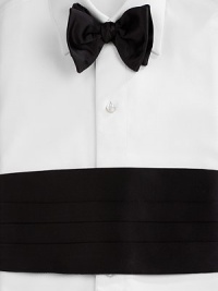 A coordinating set for every formal affair, crafted in rich silk. Includes pre-tied bowtie and stitched cummerbund Dry clean Made in USA A coordinating set for every formal affair, crafted in rich silk. Includes pre-tied bowtie and stitched cummerbund Dry clean Made in USA