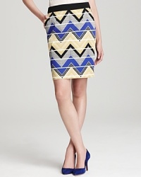 A lively zig zag print energizes this Trina Turk skirt--a stylish and slightly shorter new take on the classic pencil silhouette. A lively zig zag print energizes this Trina Turk skirt--a stylish and slightly shorter new take on the classic pencil silhouette.