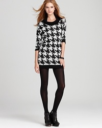 A tried and true classic print for fall, this bold houndstooth print enriches our versatile C&C California tunic--wear it with denim, leggings or tights. A tried and true classic print for fall, this bold houndstooth print enriches our versatile C&C California tunic--wear it with denim, leggings or tights.
