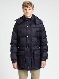 Remain cozy and dry all season long in this quilted nylon puffer, with down-fill for added warmth and large, over-sized pockets to secure all of your personal essentials.Zip-frontRemovable hoodChest slash, waist flap pocketsElasticized waistAbout 33 from shoulder to hemNylonDry cleanImported