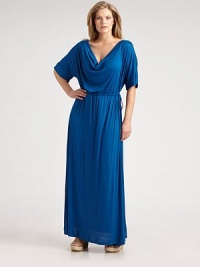 A dramatic draped neckline leads to a comfortable drawstring waist that creates the perfect hourglass shape. Elbow-length sleeves provide great arm coverage.Draped necklineElbow-length sleevesFigure-defining, drawstring waistAbout 45 from natural waist48% rayon/42% polyester/10% spandexDry cleanMade in USA of imported fabric A dramatic draped neckline leads to a comfortable drawstring waist that creates the perfect hourglass shape. Elbow-length sleeves provide great arm coverage.Draped necklineElbow-length sleevesFigure-defining, drawstring waistAbout 45 from natural waist48% rayon/42% polyester/10% spandexDry cleanMade in USA of imported fabric