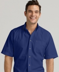 This simple button-down shirt from Tommy Hilfiger is the perfect complement to patterned shorts. This simple button-down shirt from Tommy Hilfiger is the perfect complement to patterned shorts.