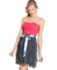A charmingly ruffled skirt and prettily pleated bodice make up this sweet strapless dress from Teeze Me -- a ribbon sash finishes the look! A charmingly ruffled skirt and prettily pleated bodice make up this sweet strapless dress from Teeze Me -- a ribbon sash finishes the look!