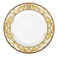 The most legendary figure of Asian mythology, the red dragon rises majestically from this fabulously opulent dinnerware from Rosenthal Meets Versace, conveying all its might and glory. Each piece features ornate golden baroque patterns and four small medallions representing the sun, and the Versace medusa decorates the background. The most legendary figure of Asian mythology, the red dragon rises majestically from this fabulously opulent dinnerware from Rosenthal Meets Versace, conveying all its might and glory. Each piece features ornate golden baroque patterns and four small medallions representing the sun, and the Versace medusa decorates the background.