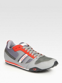 Kick up your weekend look by incorporating this high-performance design, crafted from supple leather and suede, featuring a bold, sporty color palette and a comfortable rubber sole to keep you running around town with style and ease.Leather/suede upperPadded insoleRubber soleImported Kick up your weekend look by incorporating this high-performance design, crafted from supple leather and suede, featuring a bold, sporty color palette and a comfortable rubber sole to keep you running around town with style and ease.Leather/suede upperPadded insoleRubber soleImported