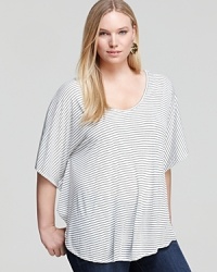 An irreverent cut puts an unexpected spin on a striped Nation LTD Plus tee. Splash the style against white denim for a clean, chic look. An irreverent cut puts an unexpected spin on a striped Nation LTD Plus tee. Splash the style against white denim for a clean, chic look.