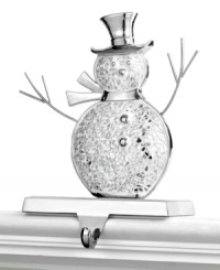 Best in snow. With a mirror mosaic, this silvertone metal stocking holder glistens like freshly fallen snow atop your mantel or bookcase. Best in snow. With a mirror mosaic, this silvertone metal stocking holder glistens like freshly fallen snow atop your mantel or bookcase.