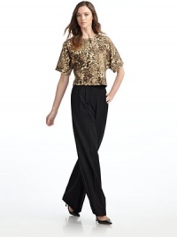 THE LOOKCrewneckConcealed front snap closureShort dolman sleevesTextured leopard printTHE FITAbout 17½ from shoulder to hemTHE MATERIAL75% wool/25% polyamideCARE & ORIGINDry cleanImported THE LOOKCrewneckConcealed front snap closureShort dolman sleevesTextured leopard printTHE FITAbout 17½ from shoulder to hemTHE MATERIAL75% wool/25% polyamideCARE & ORIGINDry cleanImported