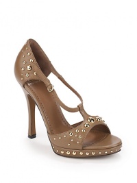 THE LOOKLeather upper with golden dome studsOpen toeAdjustable ankle strapPadded insoleSelf-covered heel, 4½(115mm)Self-covered platform with stud accents, ¾(20mm)Compares to a 3¾ heel(95mm)THE MATERIALLeather upperLeather lining and soleORIGINImported THE LOOKLeather upper with golden dome studsOpen toeAdjustable ankle strapPadded insoleSelf-covered heel, 4½(115mm)Self-covered platform with stud accents, ¾(20mm)Compares to a 3¾ heel(95mm)THE MATERIALLeather upperLeather lining and soleORIGINImported