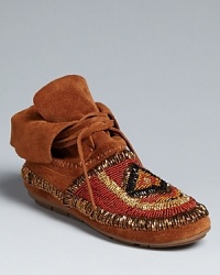 Bold, Southwestern style-in sunset tones with gleaming beading-makes these House of Harlow 1960 moccasin booties must-haves. Flip the cuff up or down, depending on your look. Bold, Southwestern style-in sunset tones with gleaming beading-makes these House of Harlow 1960 moccasin booties must-haves. Flip the cuff up or down, depending on your look.