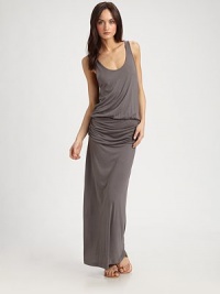 Statuesque jersey scoopneck radiates urban elegance with its elasticized drop waist, ingenious ruching and unexpected scoopback. ScoopneckSleevelessRuched, elasticized drop waistScoopbackAbout 38 from natural waistModalHand washImportedModel shown is 5'10 (177cm) wearing US size Small. Statuesque jersey scoopneck radiates urban elegance with its elasticized drop waist, ingenious ruching and unexpected scoopback. ScoopneckSleevelessRuched, elasticized drop waistScoopbackAbout 38 from natural waistModalHand washImportedModel shown is 5'10 (177cm) wearing US size Small.