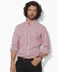 A polished stripe motif adds timeless style to a trim-fitting sport shirt in crisp cotton poplin. A polished stripe motif adds timeless style to a trim-fitting sport shirt in crisp cotton poplin.