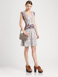 Slightly flared silhouette in an abstract floral print with unique panels that create a modern, layered look. V-neckCap sleevesButton frontAbout 21 from natural waistCottonMachine washImportedModel shown is 5'10 (177cm) wearing US size Small. Slightly flared silhouette in an abstract floral print with unique panels that create a modern, layered look. V-neckCap sleevesButton frontAbout 21 from natural waistCottonMachine washImportedModel shown is 5'10 (177cm) wearing US size Small.