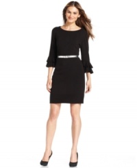 NY Collection gives this sweater dress a feminine finishing touch with a tiered ruffle at the cuffs. NY Collection gives this sweater dress a feminine finishing touch with a tiered ruffle at the cuffs.